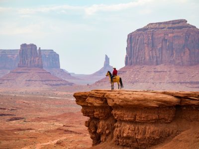 Cowboy looking at the horizon, Monument Valley Navajo Tribal Park